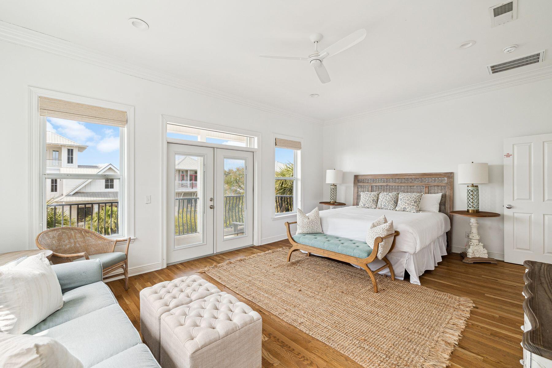 32 Hickory Street Santa Rosa Beach, FL 32459 - Photo 14 of 33 a spacious bedroom with a bed and glass window