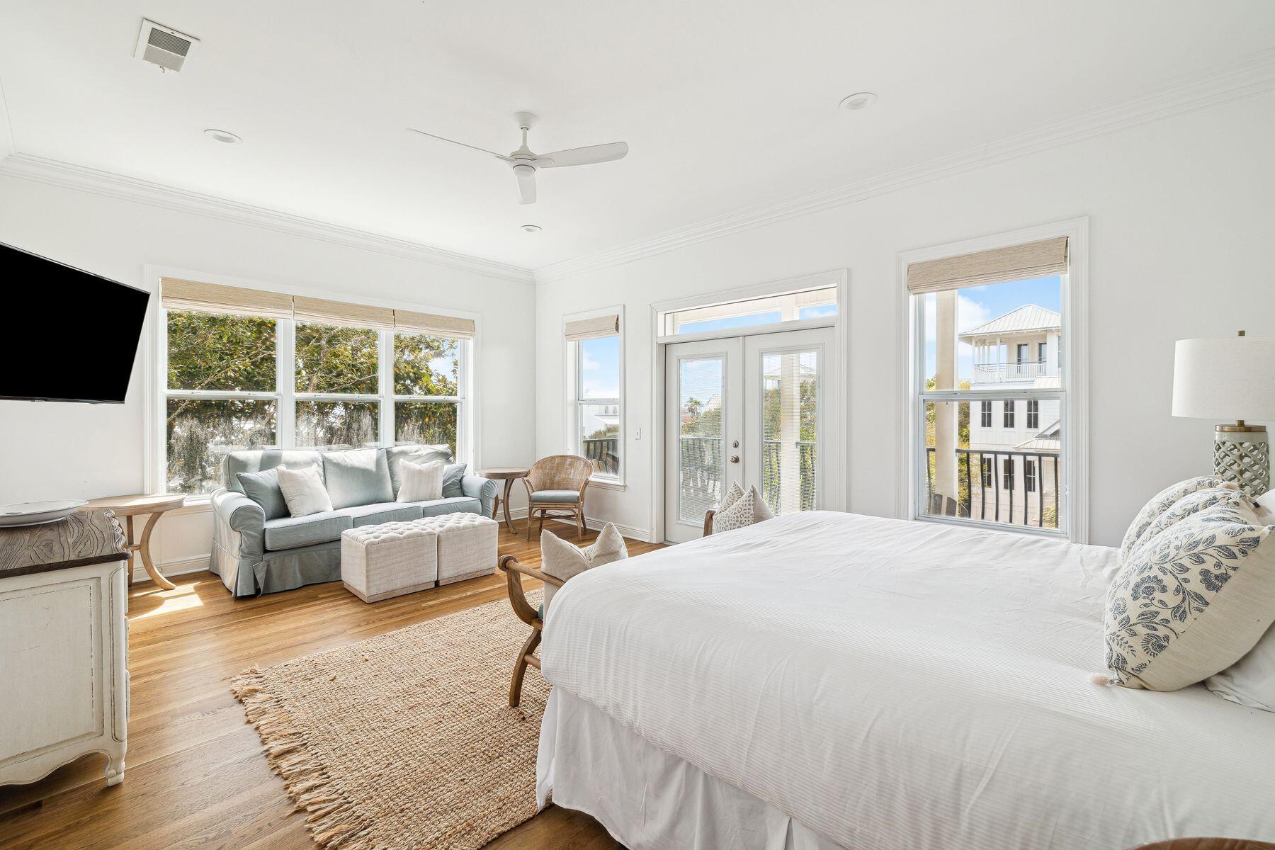 32 Hickory Street Santa Rosa Beach, FL 32459 - Photo 15 of 33 a bedroom with a large bed and a flat screen tv