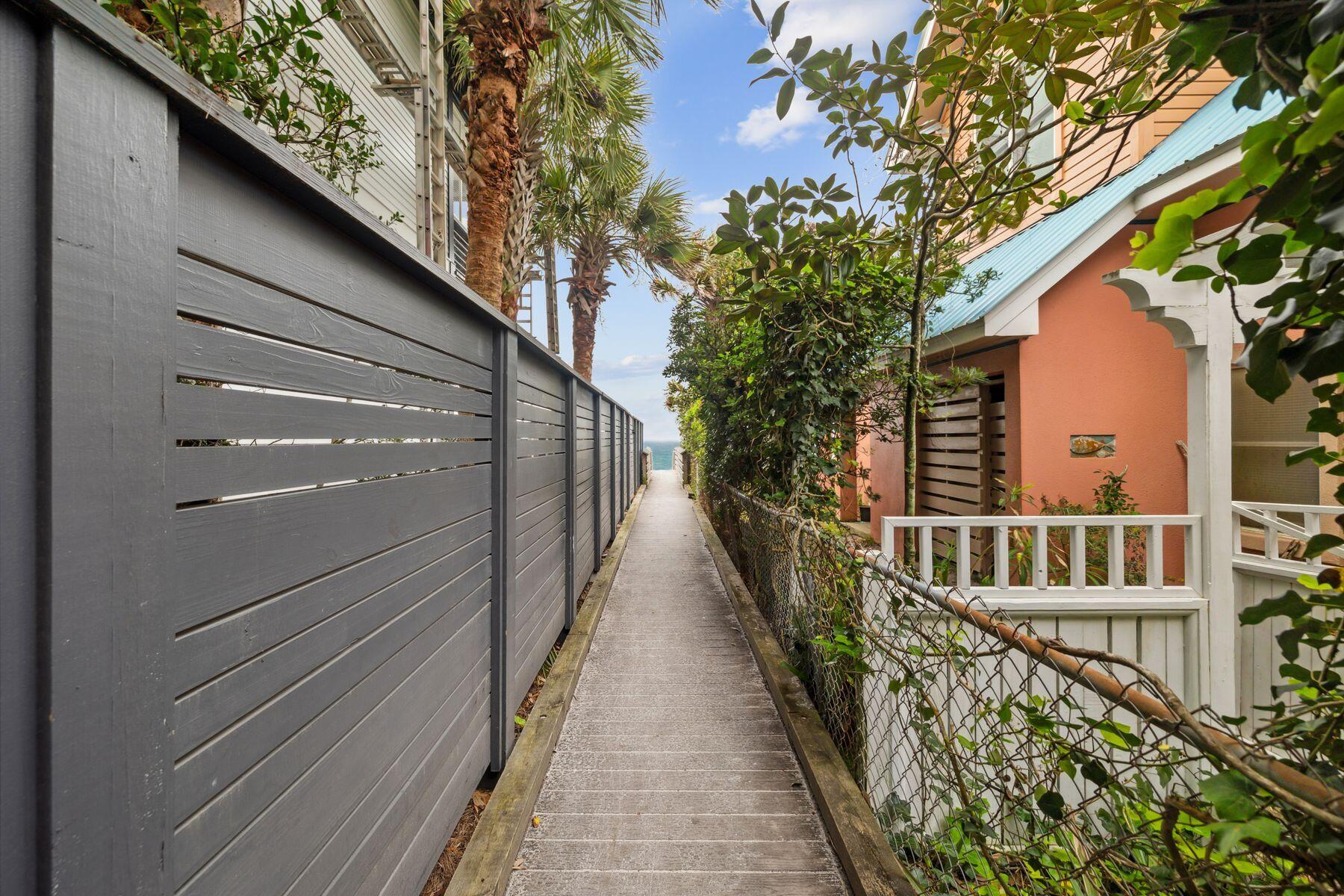32 Hickory Street Santa Rosa Beach, FL 32459 - Photo 28 of 33 a view of a pathway of a house with wooden floor