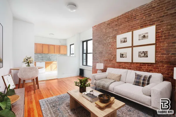 a living room with furniture and a table