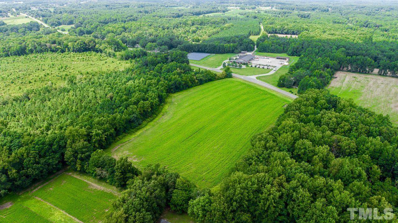 20-acres Oxford Road Roxboro, NC 27573 - Photo 4 of 10 an aerial view of residential houses with outdoor space and trees