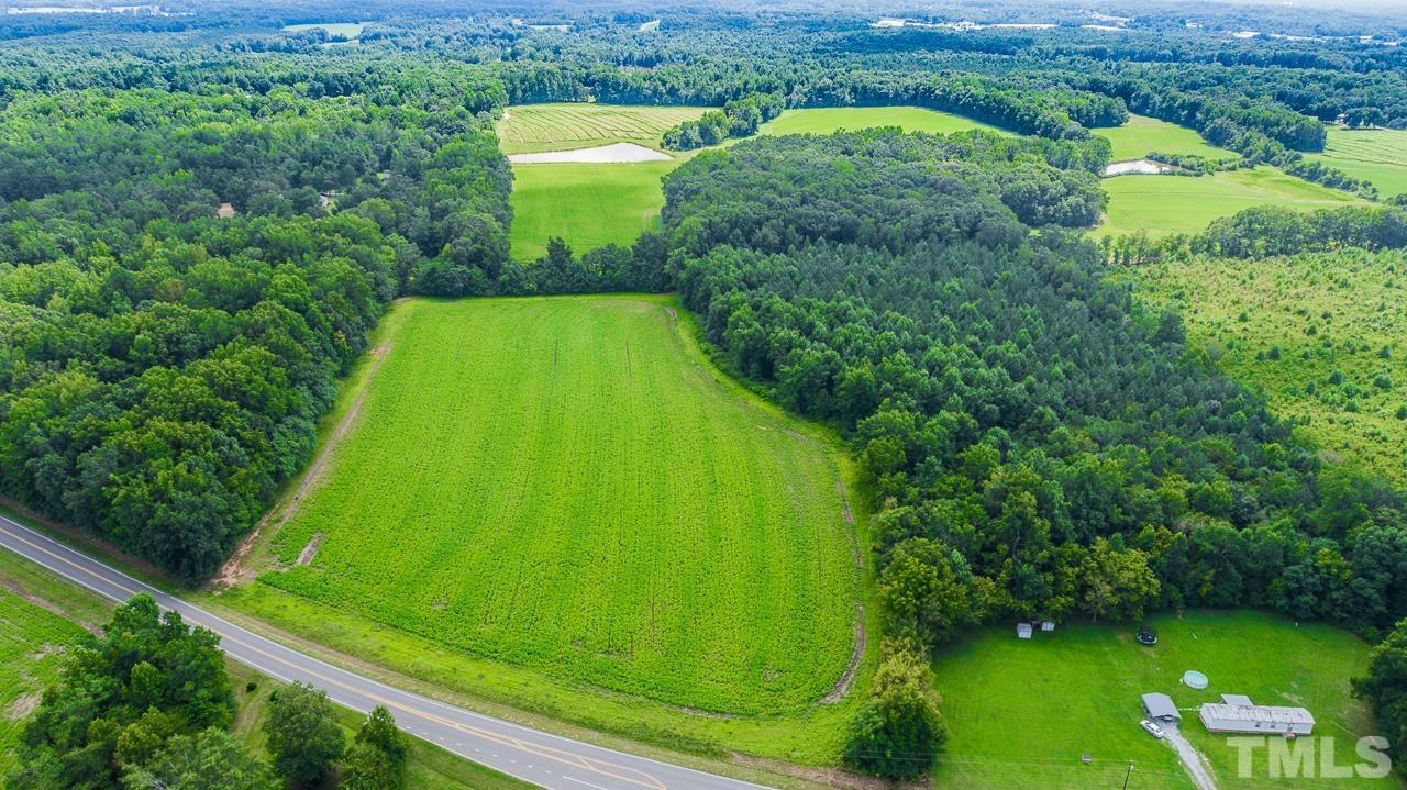 20-acres Oxford Road Roxboro, NC 27573 - Photo 8 of 10 a view of a garden with a lake