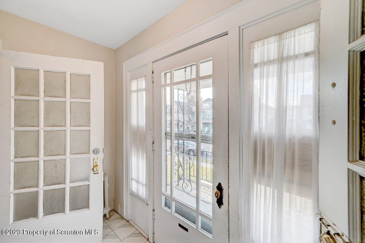 538 Wheeler Avenue Scranton, PA 18510 - Photo 4 of 65 a view of a bathroom with a glass door