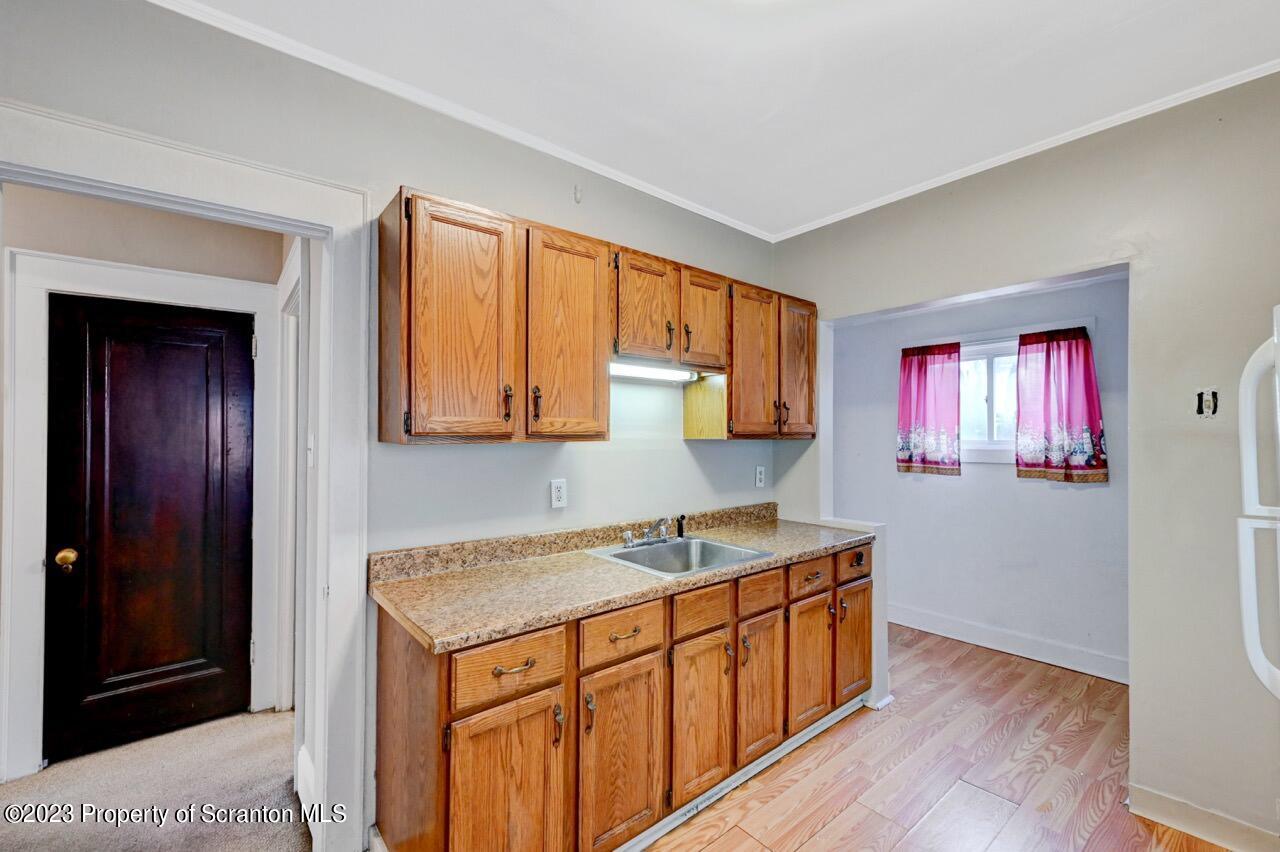 538 Wheeler Avenue Scranton, PA 18510 - Photo 43 of 65 a kitchen with a sink stove and cabinets