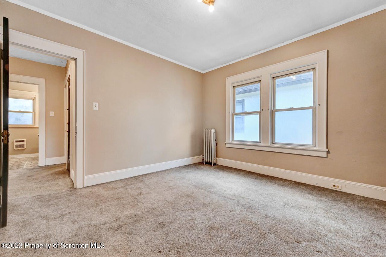 538 Wheeler Avenue Scranton, PA 18510 - Photo 57 of 65 an empty room with windows and closet