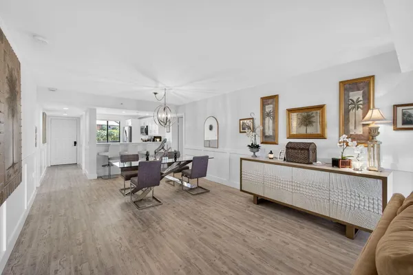 a bed room with a bed and a large window