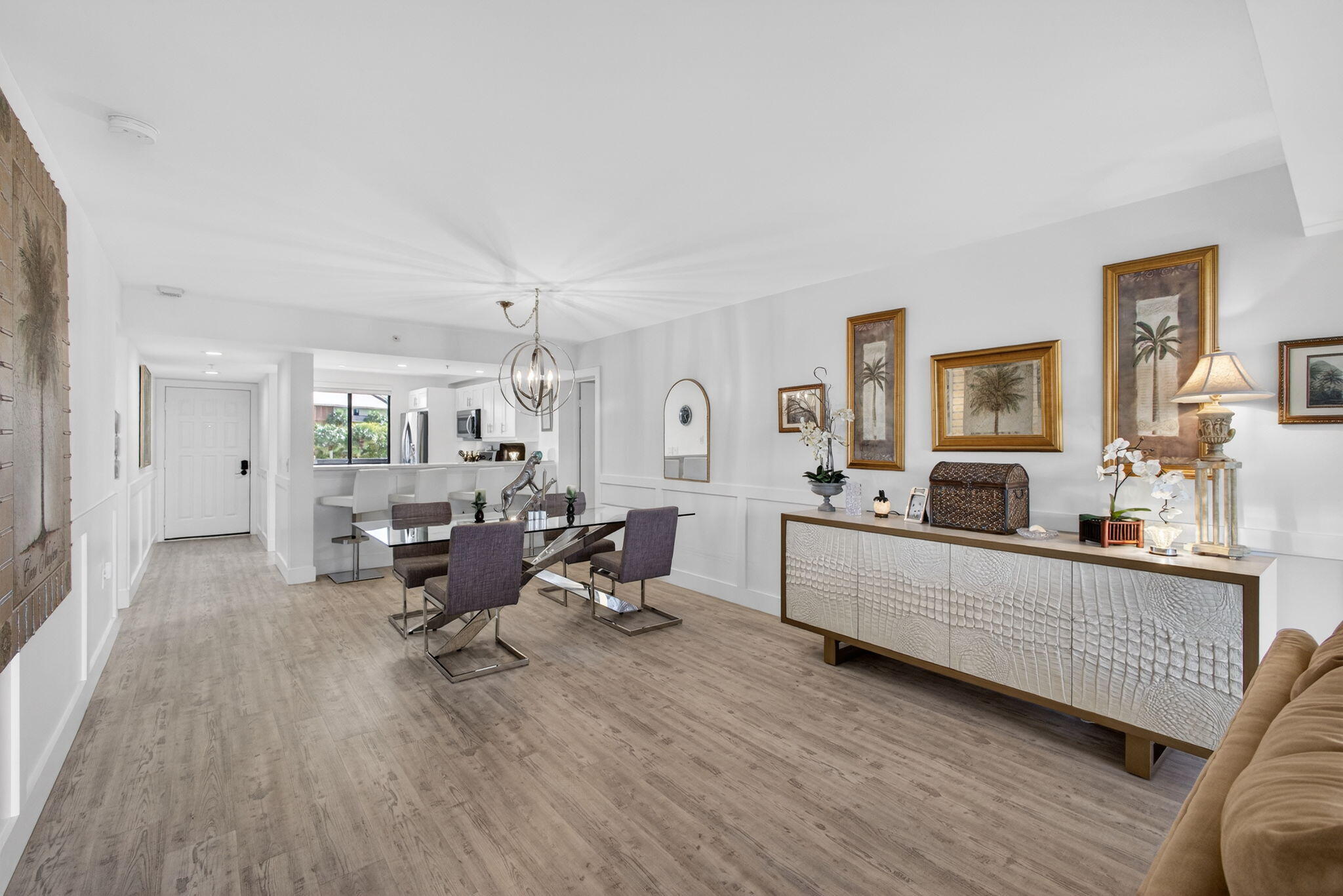 1901 Marina Isle Way, Unit 304 Jupiter, FL 33477 - Photo 16 of 64 a living room with furniture and wooden floor