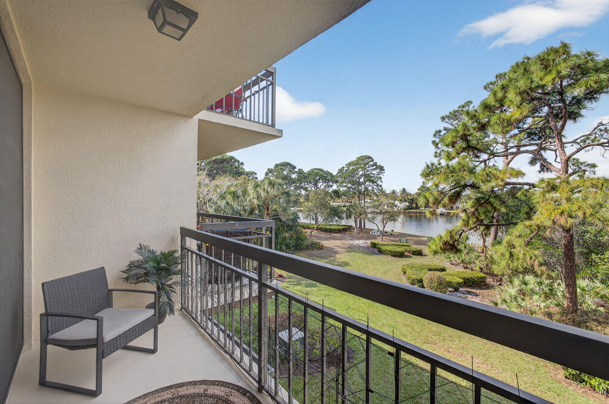 1901 Marina Isle Way, Unit 304 Jupiter, FL 33477 - Photo 20 of 64 BALCONY OFF OF MASTER BD