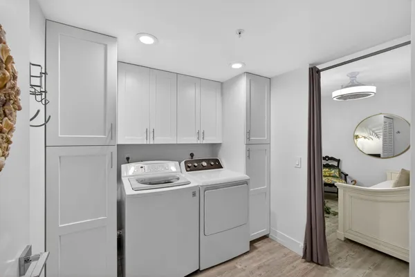 a view of a balcony with wooden floor