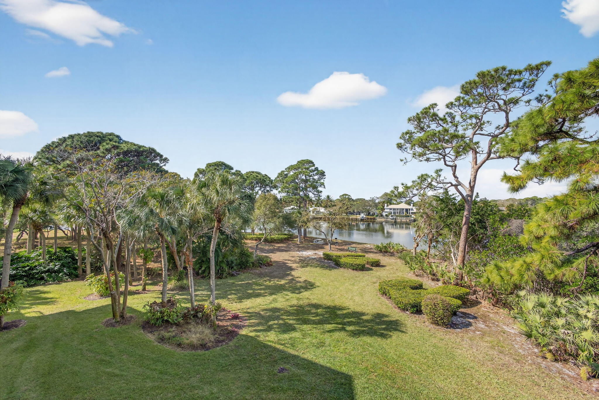 1901 Marina Isle Way, Unit 304 Jupiter, FL 33477 - Photo 36 of 64 a view of a lake with houses