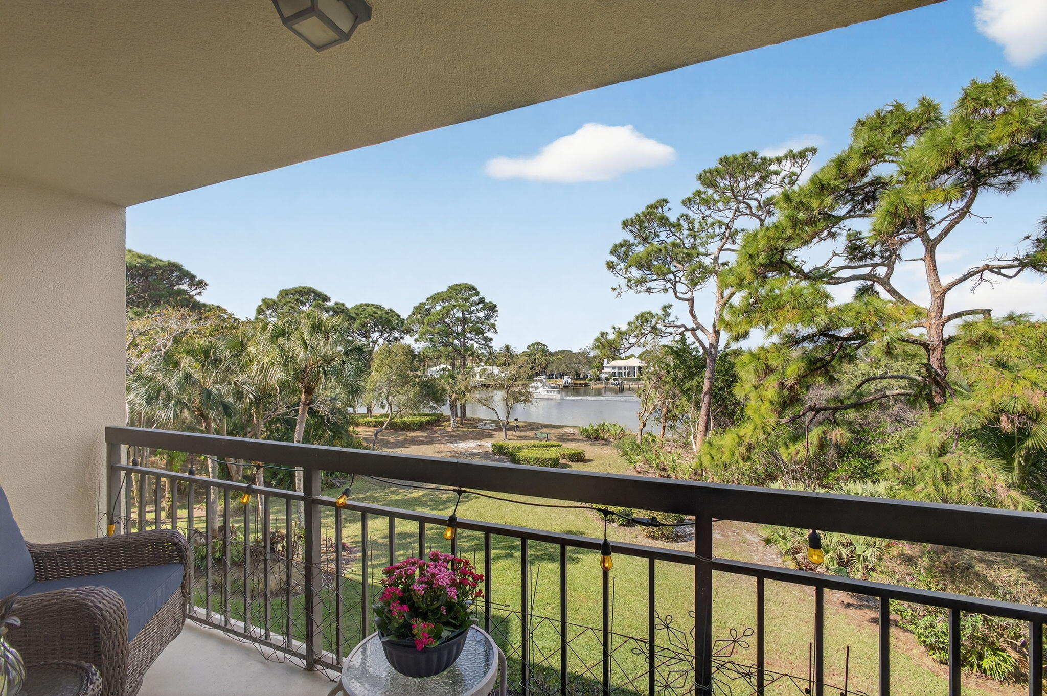 1901 Marina Isle Way, Unit 304 Jupiter, FL 33477 - Photo 42 of 64 a view of a balcony next to a yard