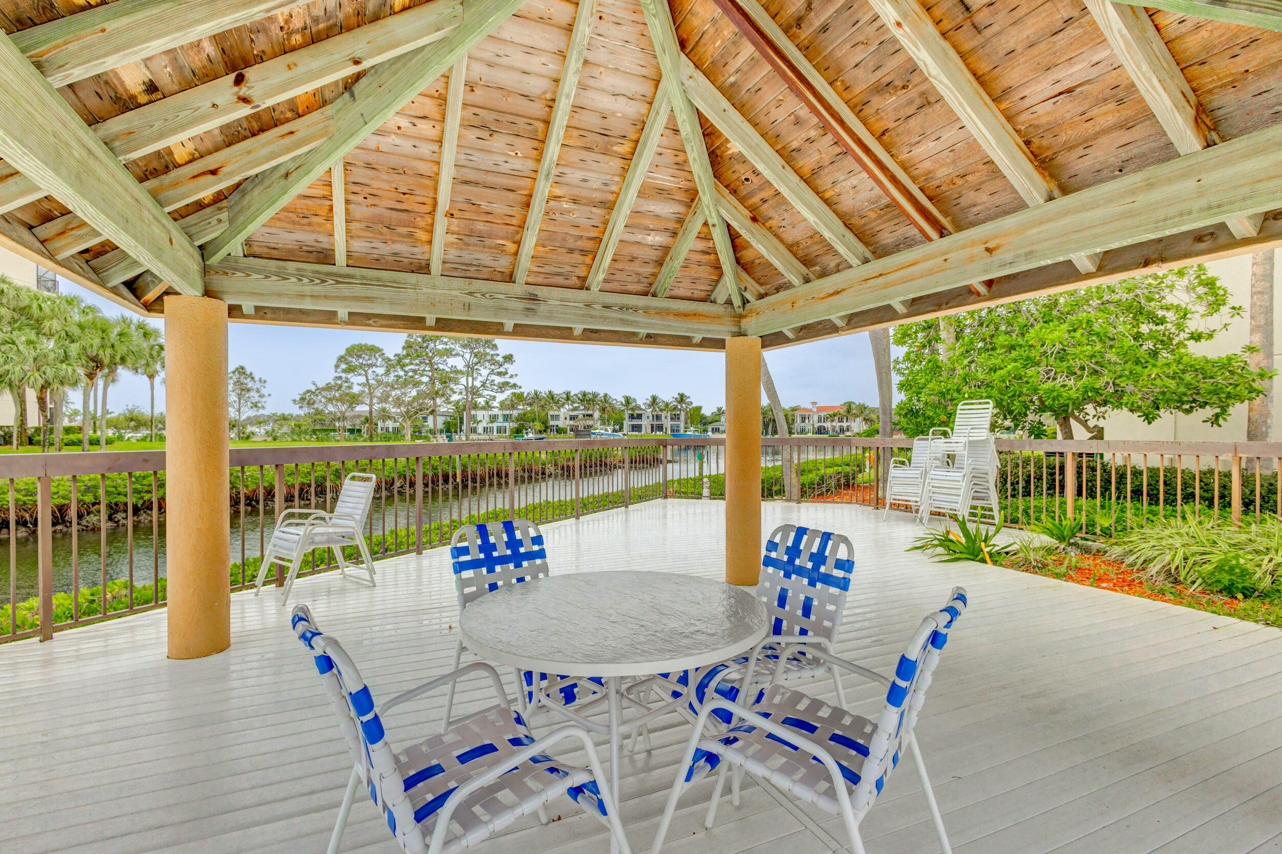 1901 Marina Isle Way, Unit 304 Jupiter, FL 33477 - Photo 58 of 64 an outdoor space with furniture and garden view