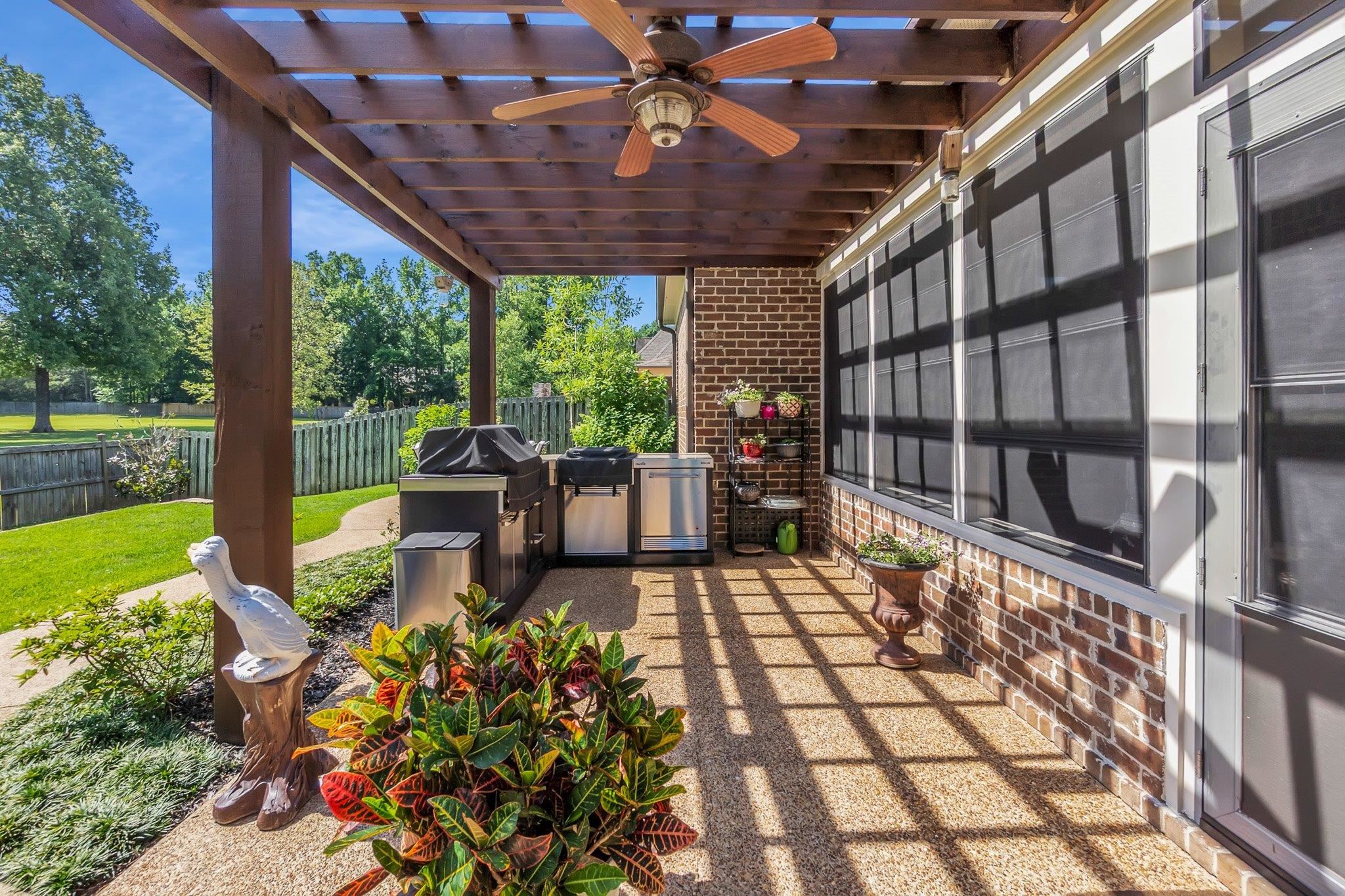 3246 North Hartwell Ridge Drive Collierville, TN 38017 - Photo 37 of 40 Covered patio featuring a wood pergola and ceiling fan