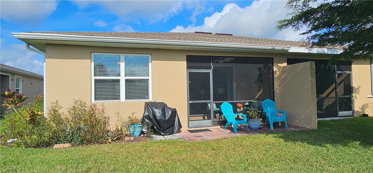 10788 Crossback Lane Lehigh Acres, FL 33936 - Photo 25 of 32 a view of outdoor space and yard