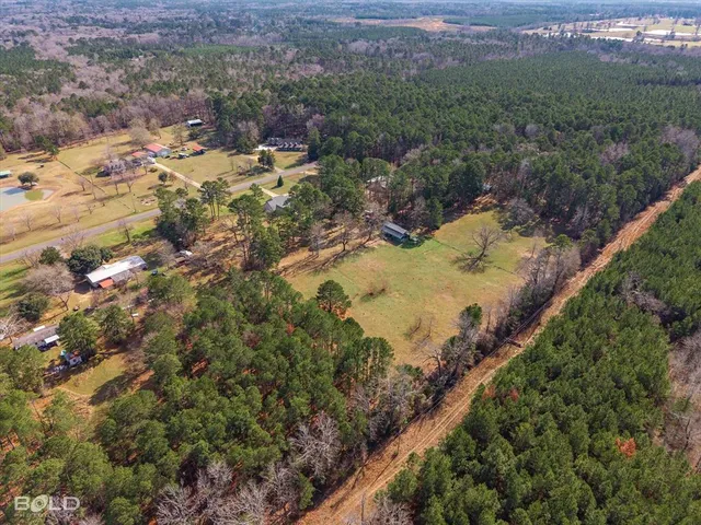 a view of a backyard of a house