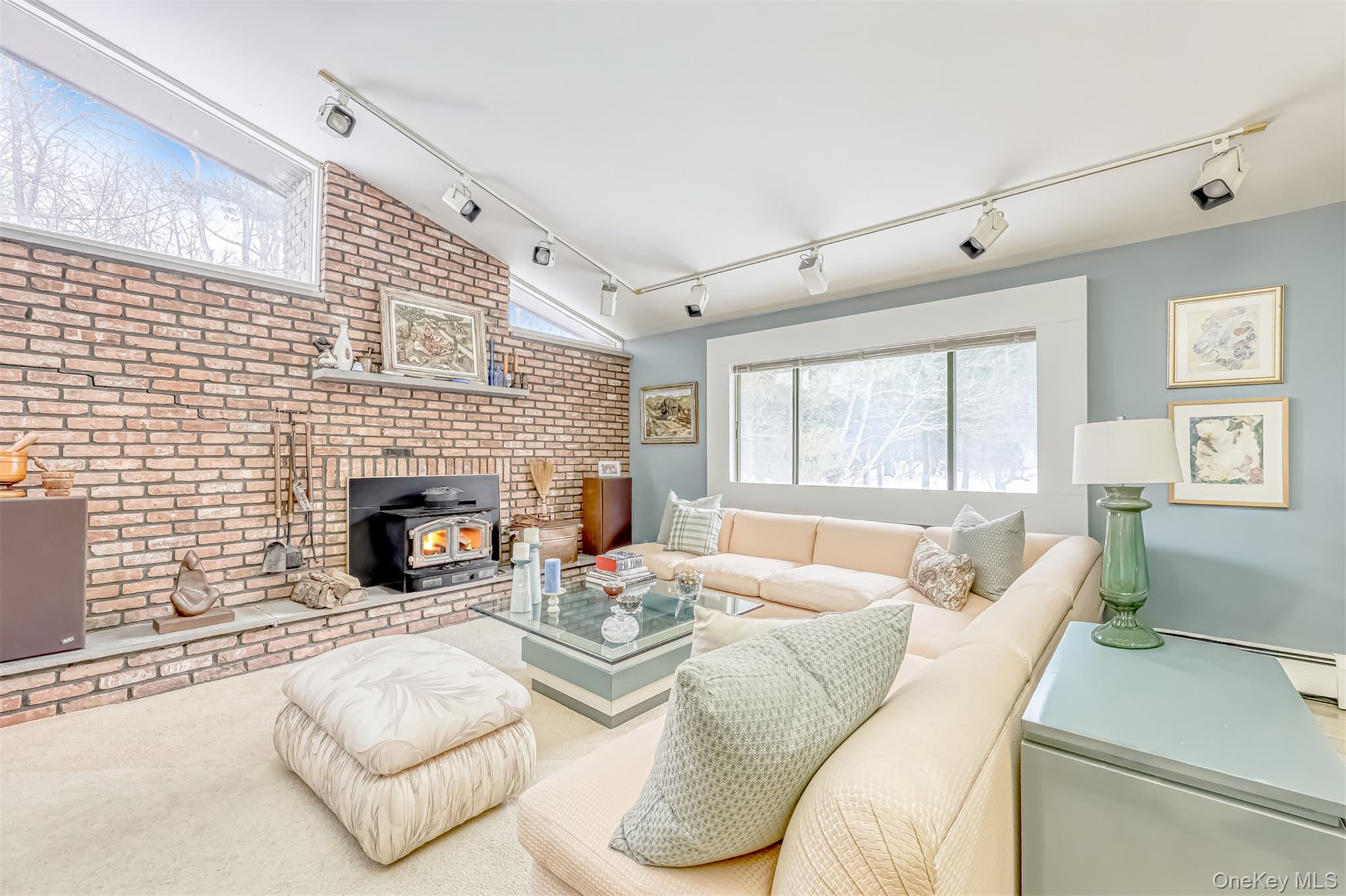 49 Camp Hill Road Pomona, NY 10970 - Photo 4 of 19 a living room with furniture large window and a fireplace