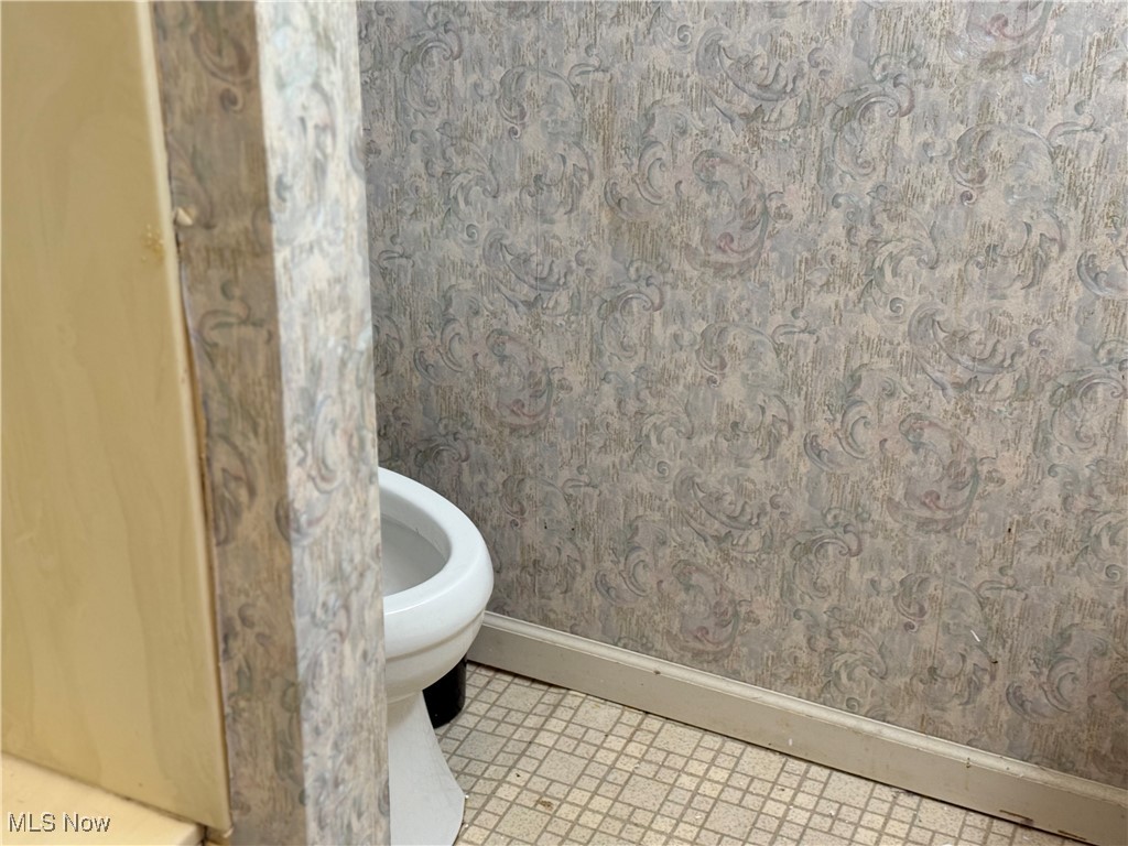 68697 Morristown Flushing Road Flushing, OH 43977 - Photo 26 of 33 Bathroom with toilet, baseboards, and wallpapered walls