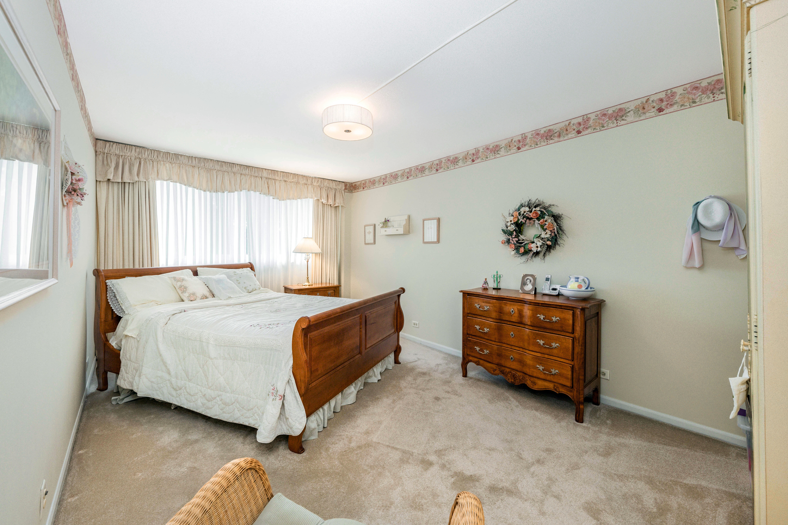 101 Bar Harbour Road, Unit 2G Schaumburg, IL 60193 - Photo 13 of 24 a bedroom with a bed and a dresser