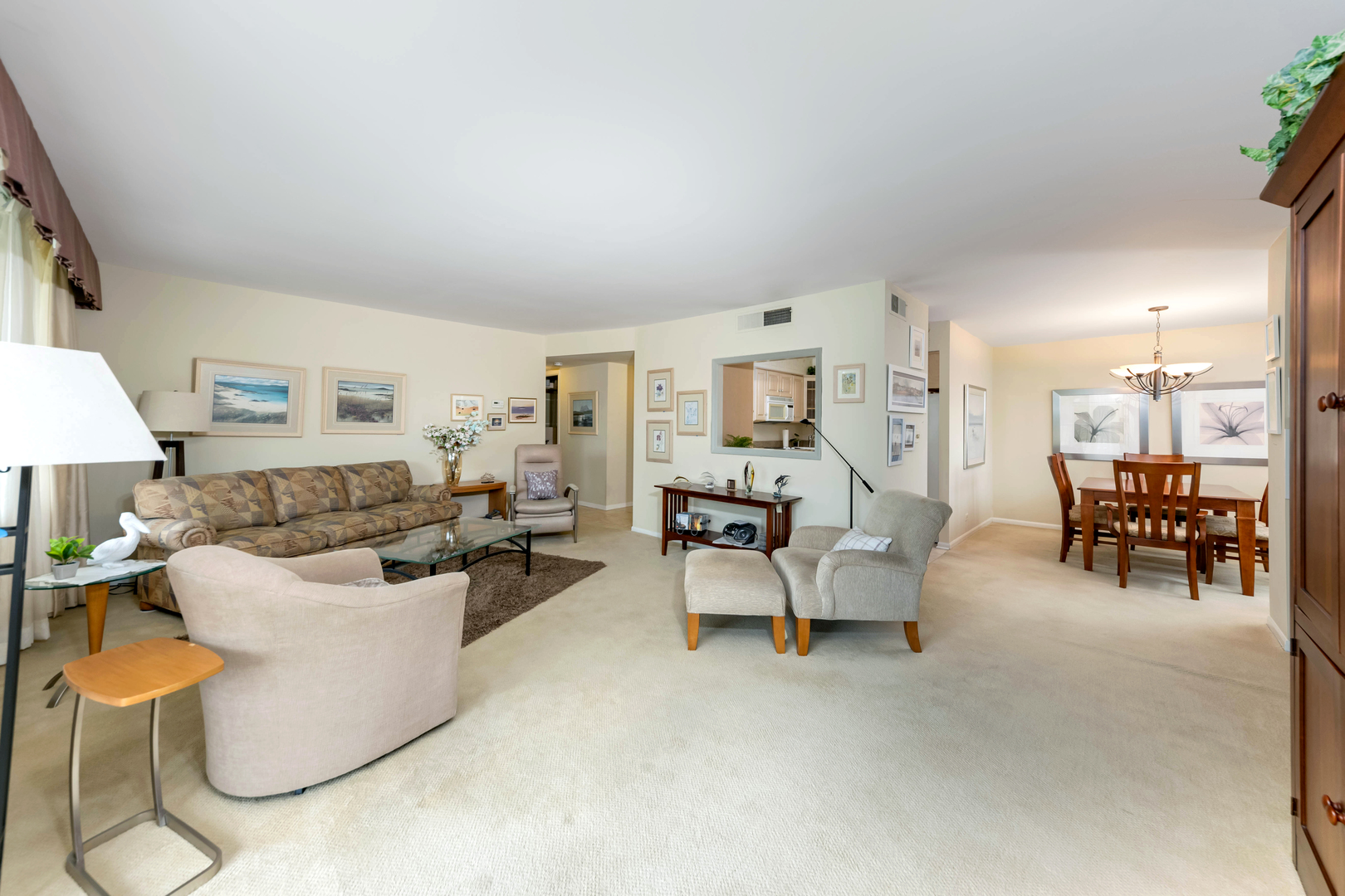 101 Bar Harbour Road, Unit 2G Schaumburg, IL 60193 - Photo 6 of 24 a living room with furniture and a table