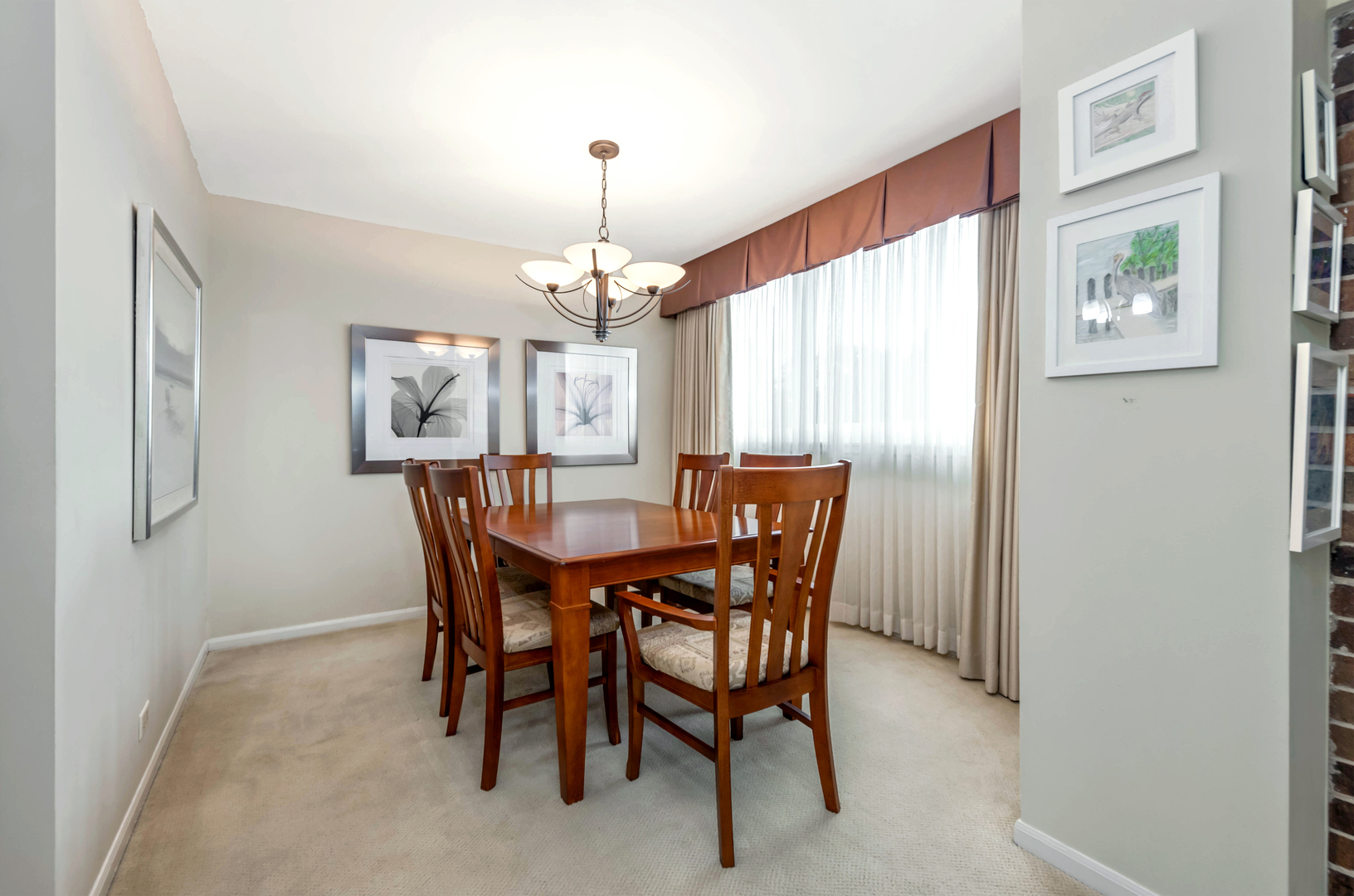 101 Bar Harbour Road, Unit 2G Schaumburg, IL 60193 - Photo 10 of 24 a view of a dining room with furniture window and wooden floor