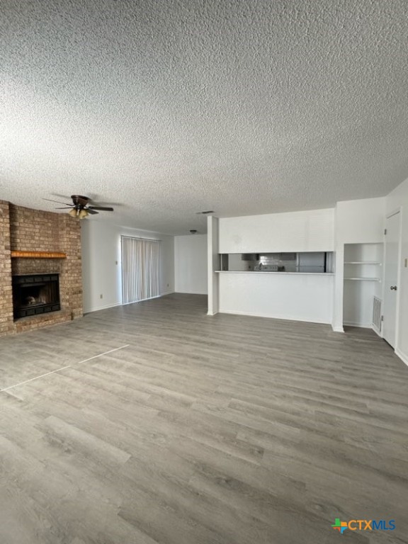 1815 Cedarhill Drive, Unit C Killeen, TX 76543 - Photo 5 of 27 a view of empty room with a fireplace
