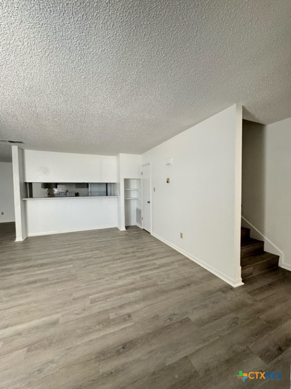 1815 Cedarhill Drive, Unit C Killeen, TX 76543 - Photo 6 of 27 a view of empty room with wooden floor