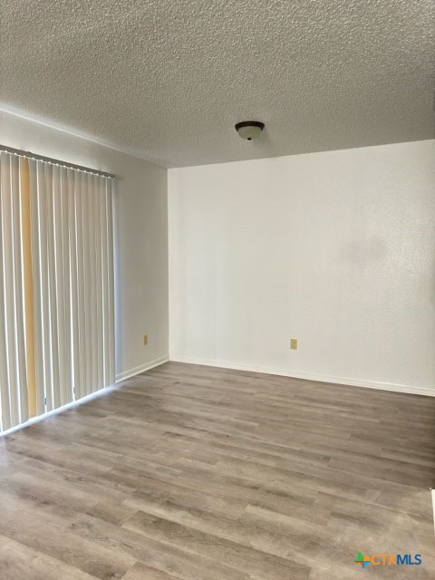 1815 Cedarhill Drive, Unit C Killeen, TX 76543 - Photo 7 of 27 a view of an empty room