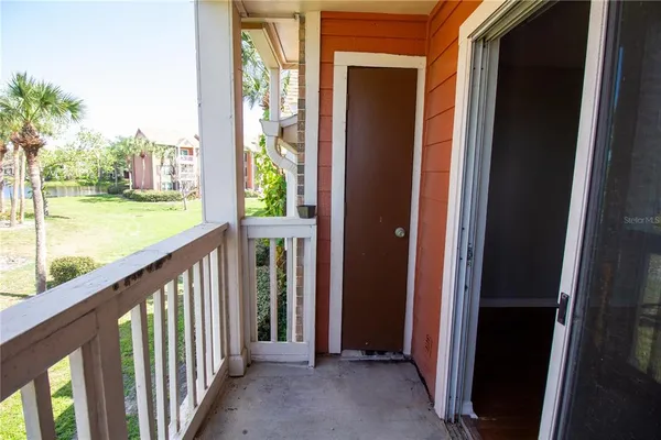 a view of a porch with a yard