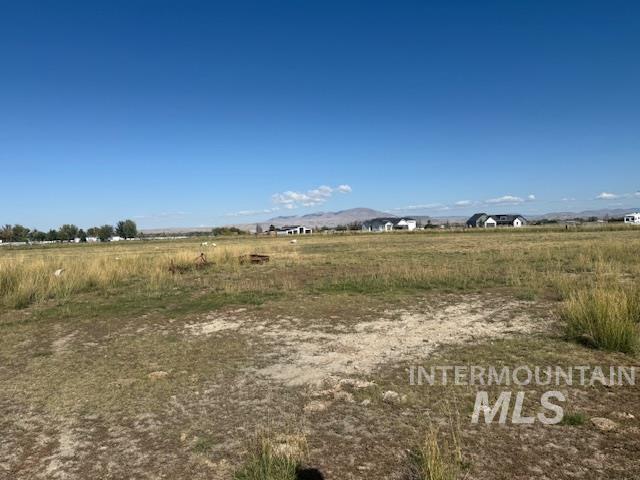2900 West Sales Yard Road Emmett, ID 83617 - Photo 8 of 18 View of yard featuring a view of countryside and a mountain view
