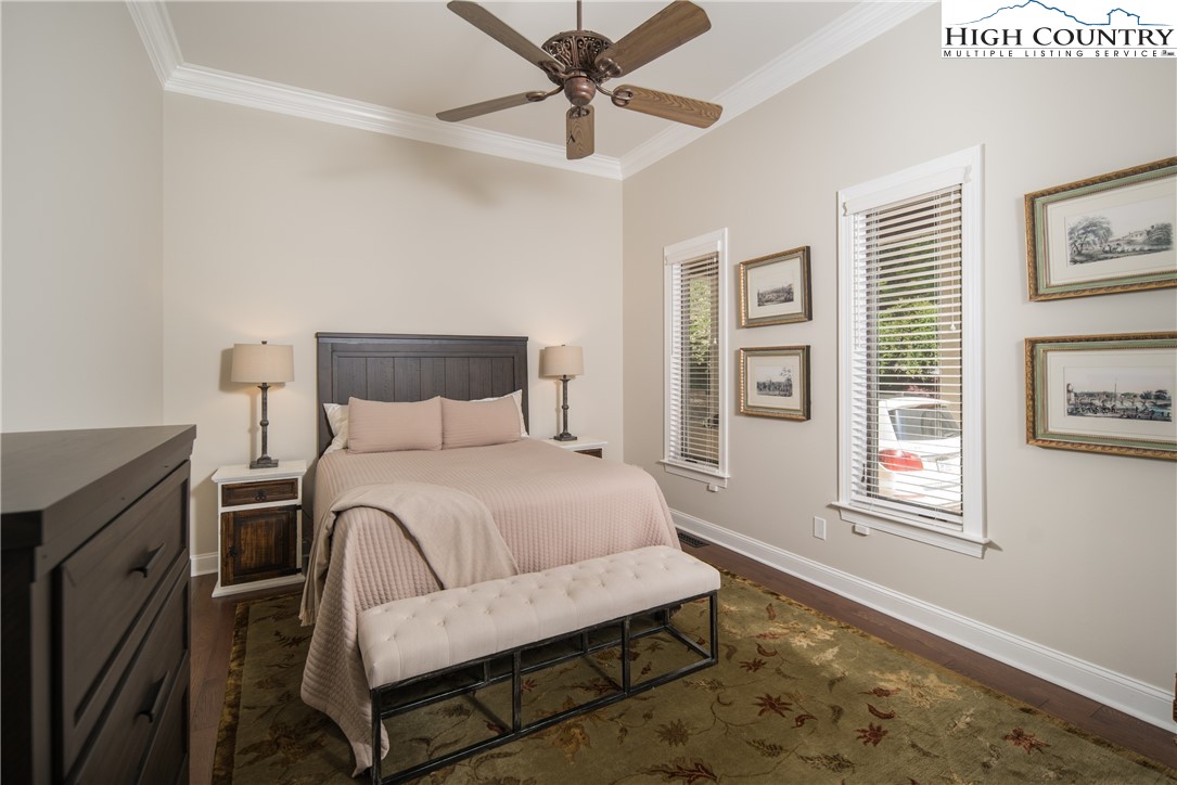 1005 Evergreen Drive Boone, NC 28607 - Photo 18 of 44 a bedroom with a bed dresser and a window