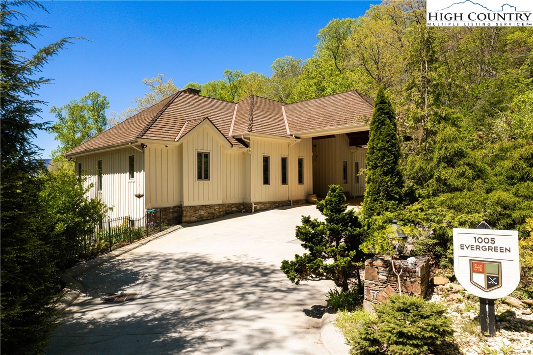 1005 Evergreen Drive Boone, NC 28607 - Photo 2 of 44 a front view of a house with a yard