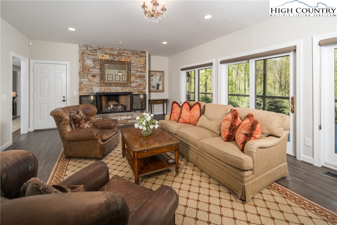 1005 Evergreen Drive Boone, NC 28607 - Photo 22 of 44 a living room with furniture and a fireplace