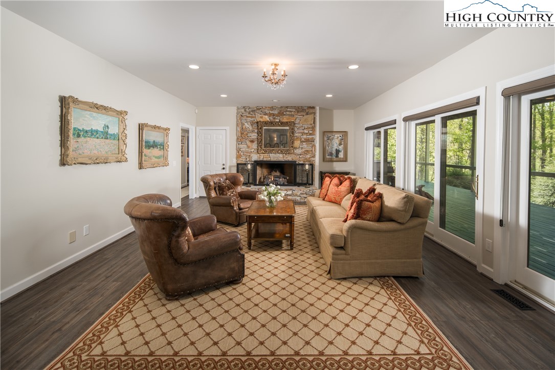 1005 Evergreen Drive Boone, NC 28607 - Photo 23 of 44 a living room with furniture and a large window