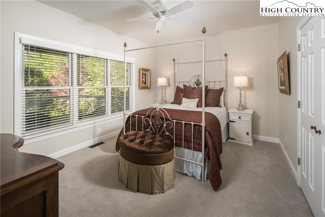 1005 Evergreen Drive Boone, NC 28607 - Photo 27 of 44 a bedroom with a bed and a window
