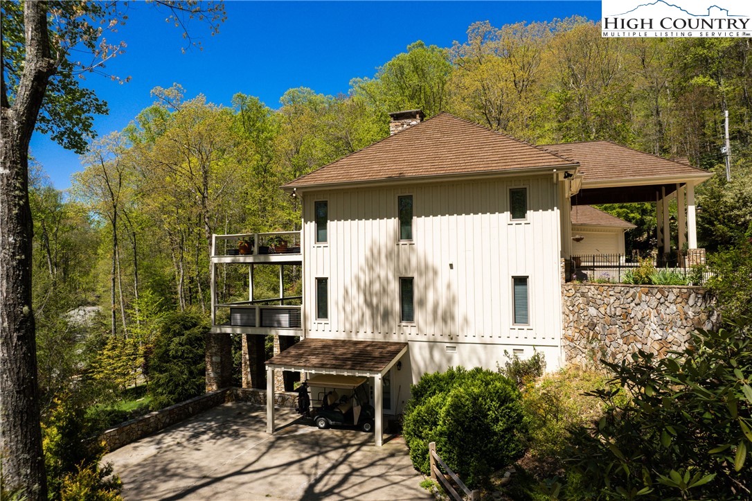 1005 Evergreen Drive Boone, NC 28607 - Photo 3 of 44 a front view of a house with garden