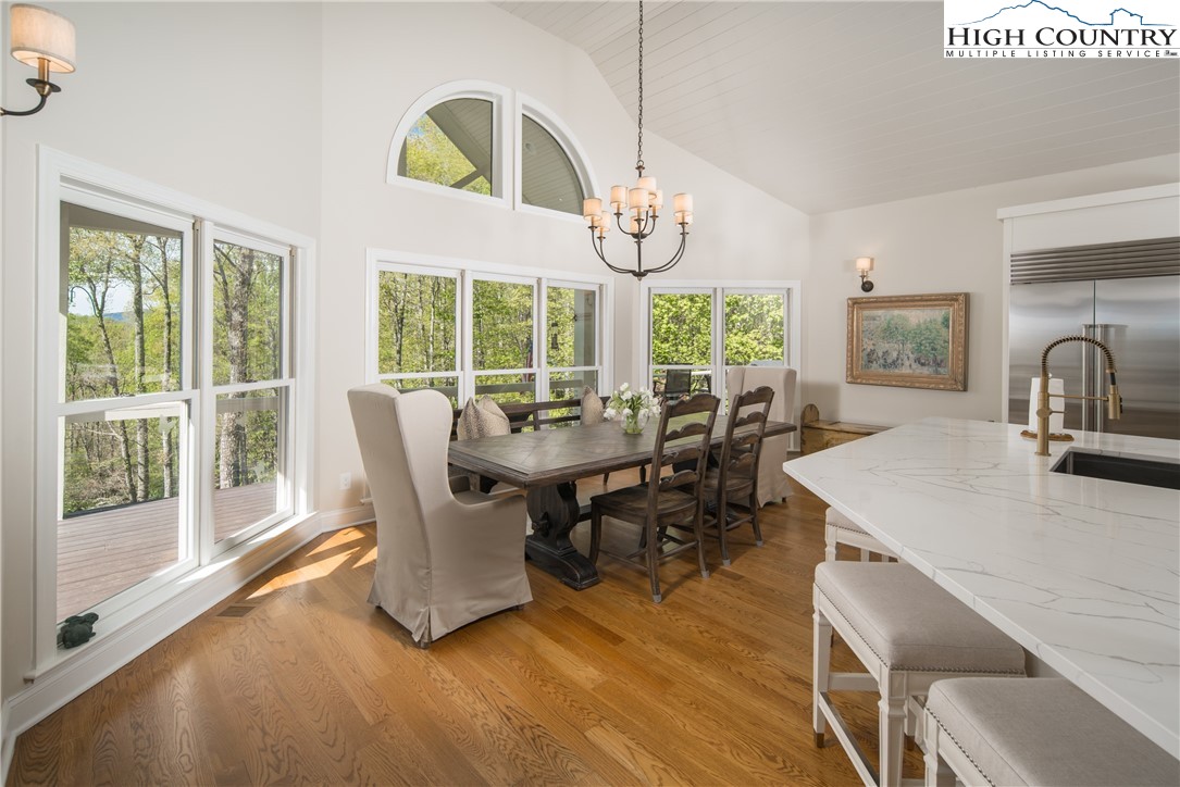 1005 Evergreen Drive Boone, NC 28607 - Photo 8 of 44 a view of a dining room with furniture window and outside view