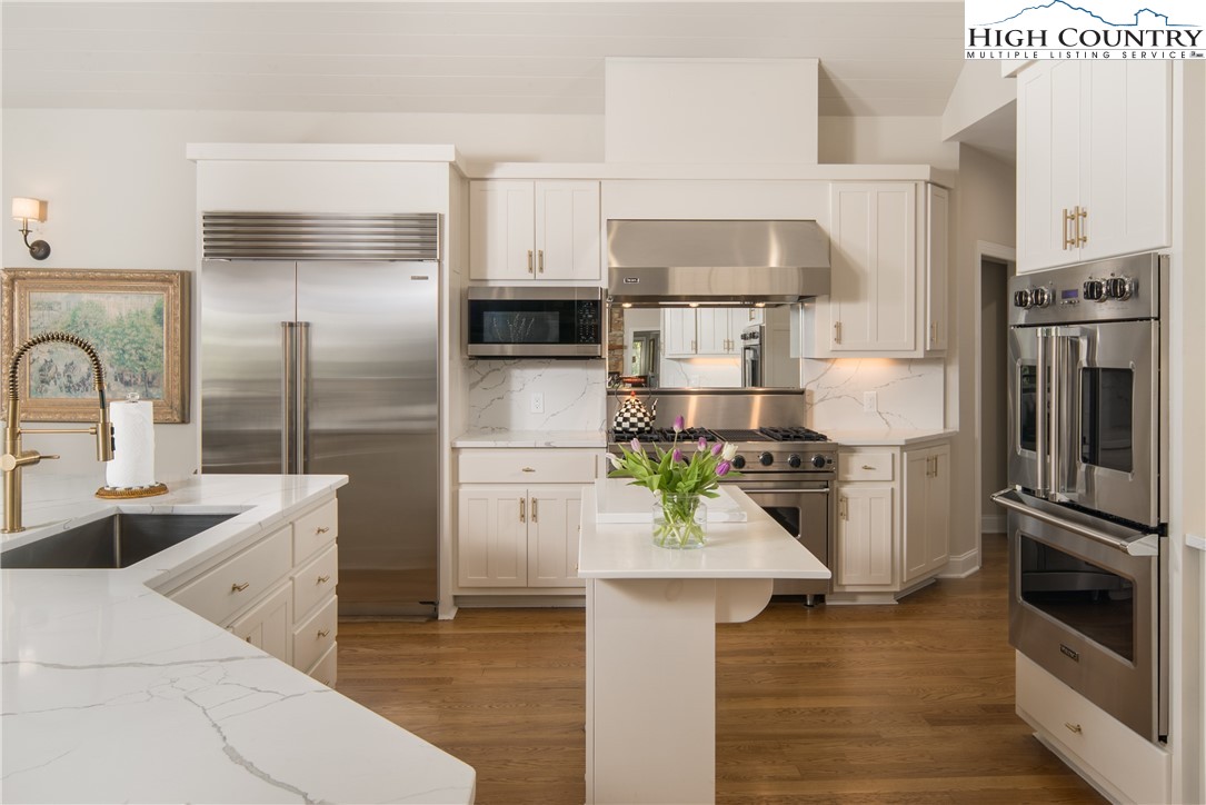 1005 Evergreen Drive Boone, NC 28607 - Photo 9 of 44 a kitchen with stainless steel appliances a refrigerator sink and stove