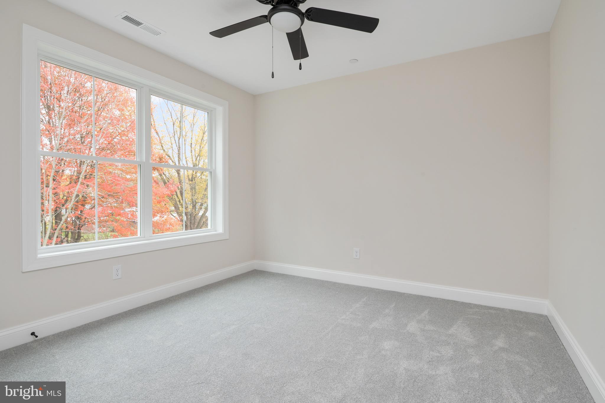 208 Long Point Road Stevensville, MD 21666 - Photo 26 of 52 an empty room with a window