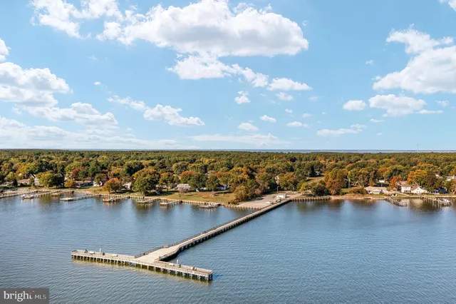 a view of ocean with a terrace