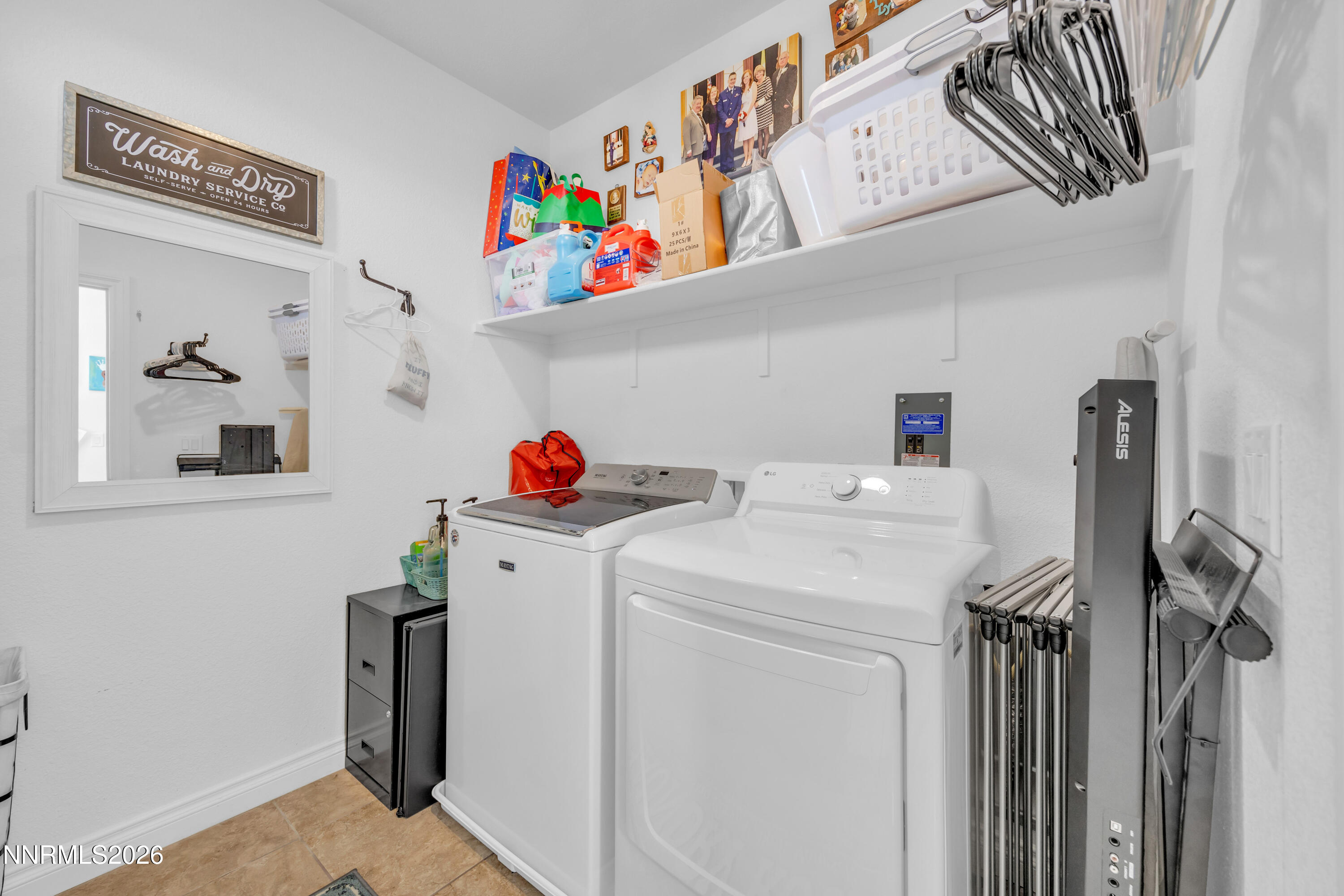 18648 Granite Peak Court Reno, NV 89508 - Photo 35 of 53 a utility room with dryer and washer