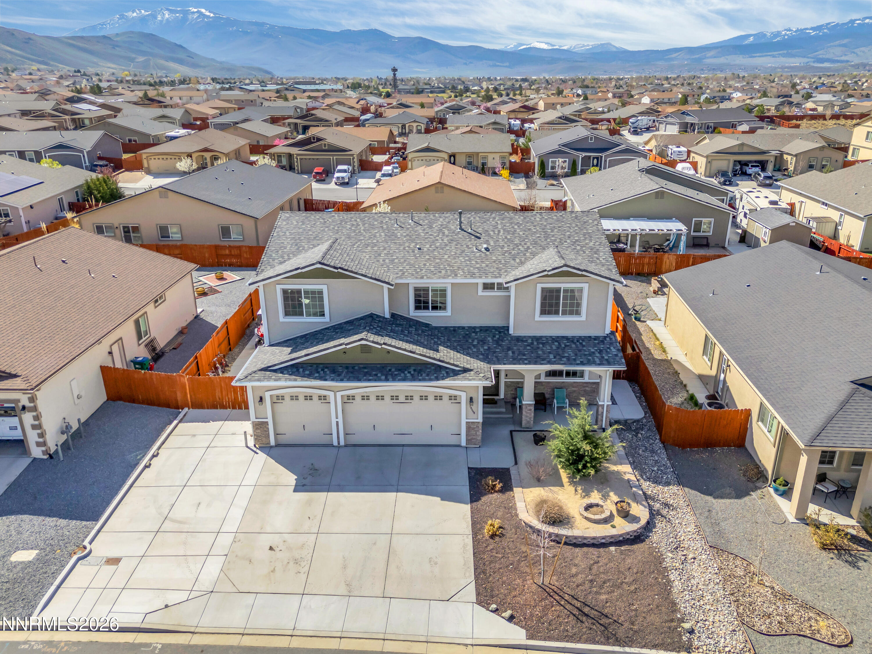 18648 Granite Peak Court Reno, NV 89508 - Photo 38 of 53 an aerial view of a house with patio