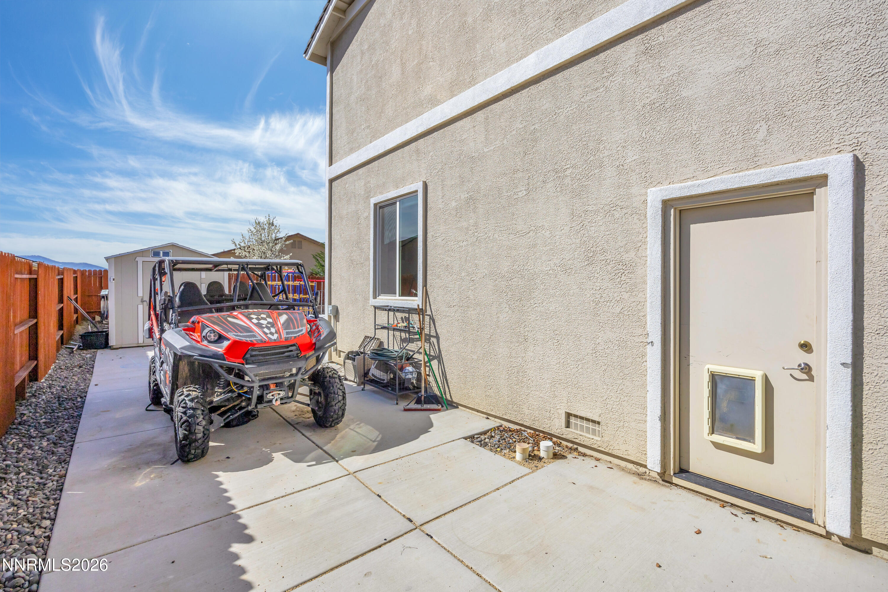 18648 Granite Peak Court Reno, NV 89508 - Photo 39 of 53 a view of a room with cars parked front of it