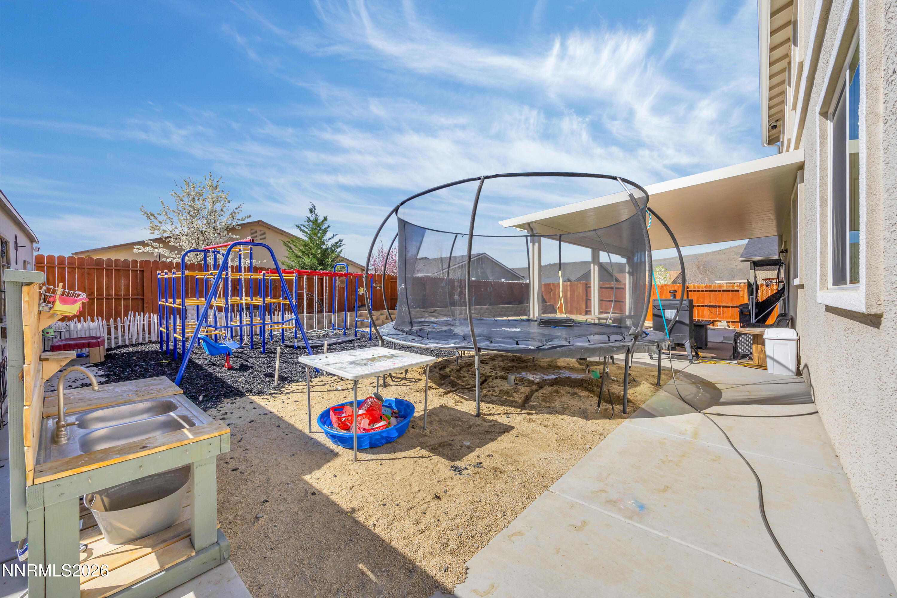 18648 Granite Peak Court Reno, NV 89508 - Photo 40 of 53 a view of swimming pool with outdoor seating