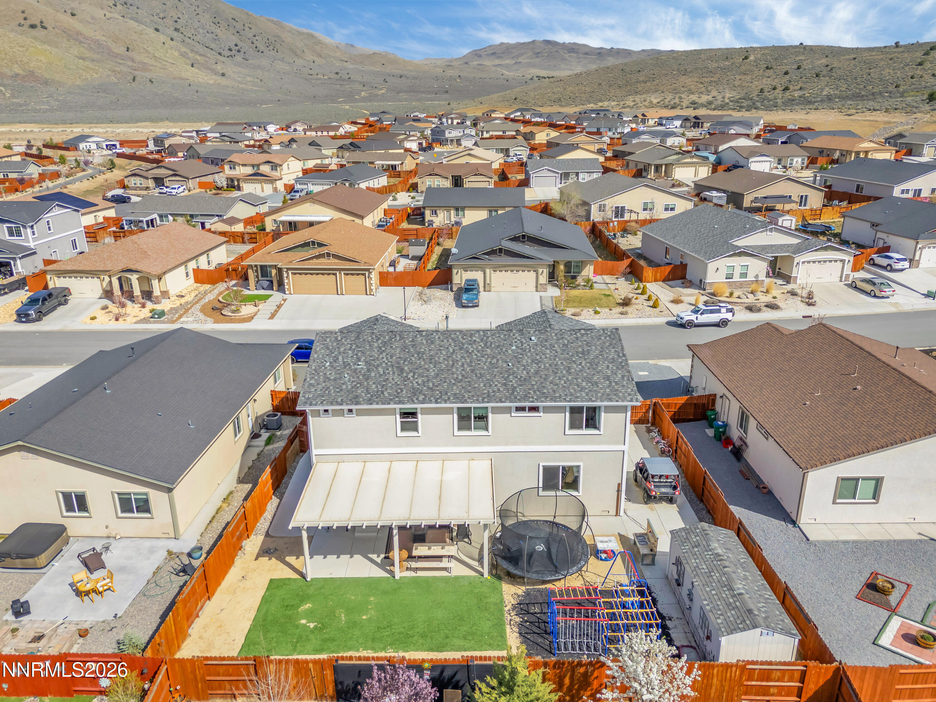 18648 Granite Peak Court Reno, NV 89508 - Photo 48 of 53 an aerial view of residential houses with outdoor space