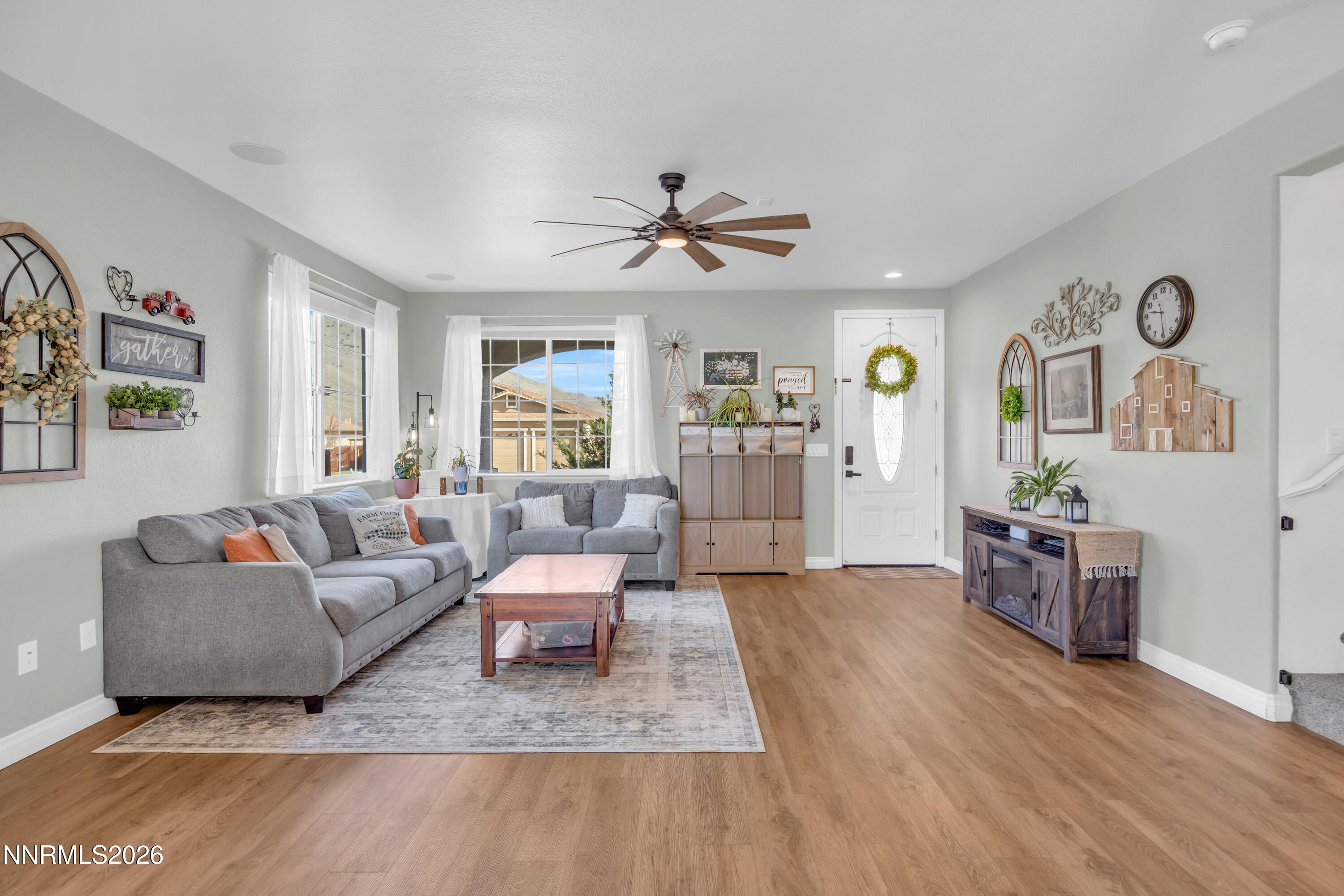 18648 Granite Peak Court Reno, NV 89508 - Photo 5 of 53 a living room with furniture and wooden floor