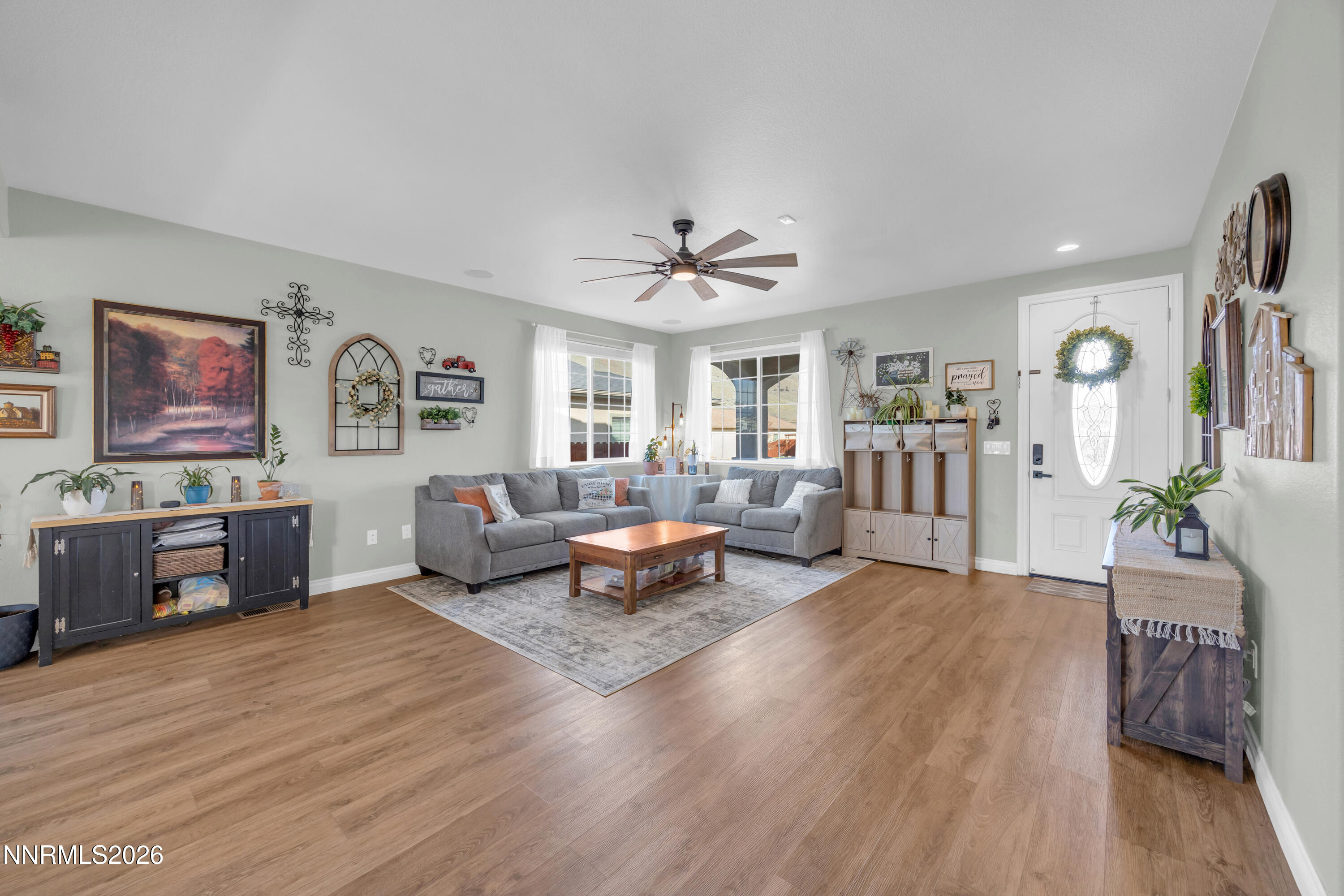 18648 Granite Peak Court Reno, NV 89508 - Photo 6 of 53 a living room with furniture and wooden floor
