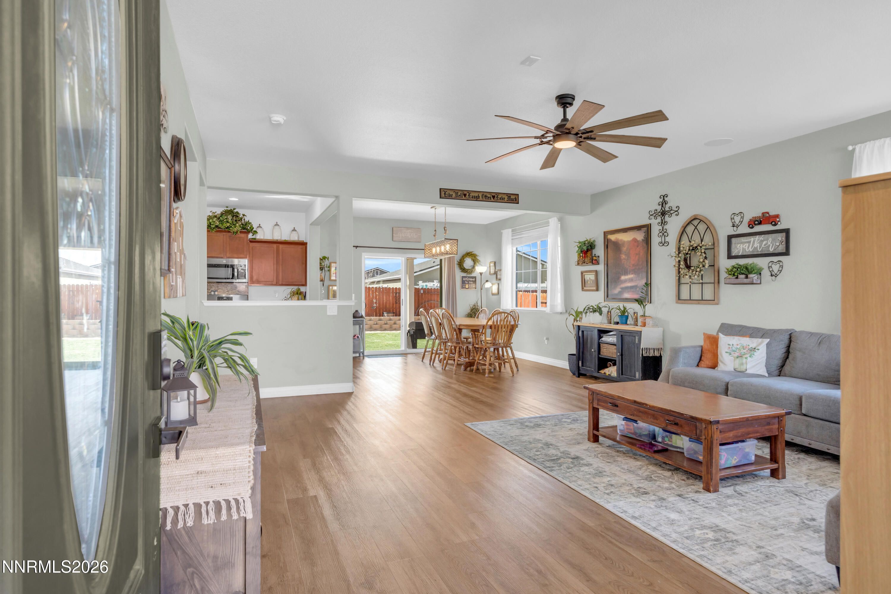 18648 Granite Peak Court Reno, NV 89508 - Photo 8 of 53 a living room with furniture and wooden floor