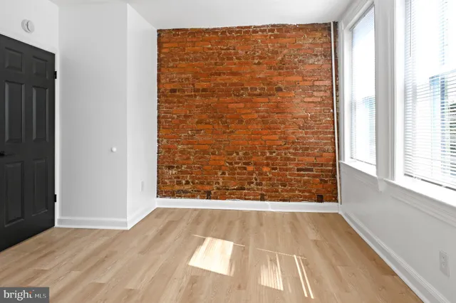 a view of an empty room and window