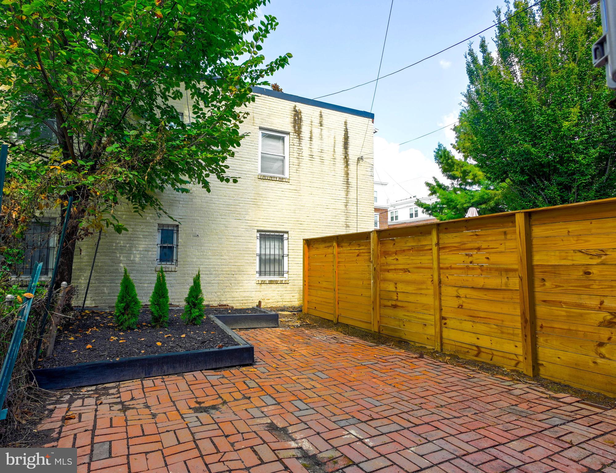 1702 A Street Southeast Washington, DC 20003 - Photo 20 of 24 a view of a house with a backyard