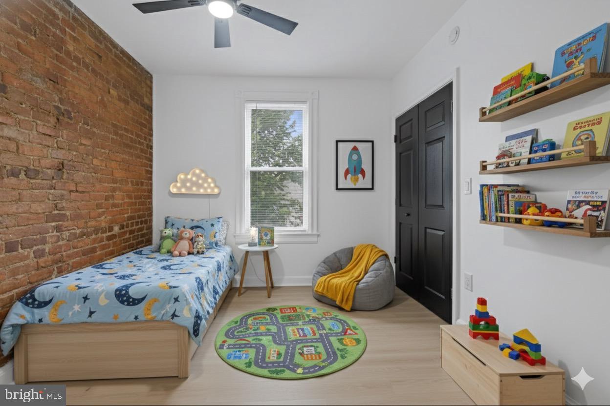 1702 A Street Southeast Washington, DC 20003 - Photo 23 of 24 a bedroom with furniture and a bed
